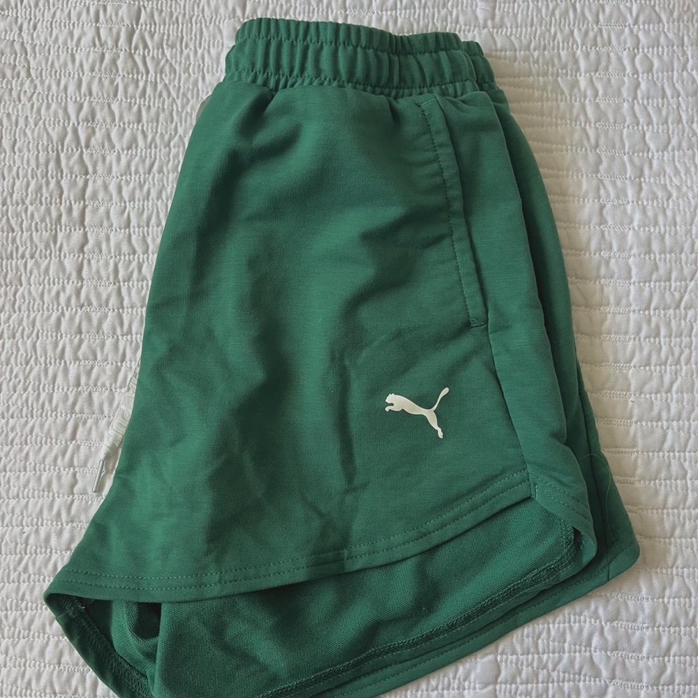 green puma shorts